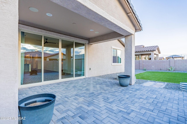 view of patio featuring fence