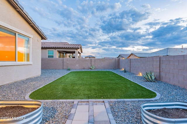 view of yard featuring a fenced backyard