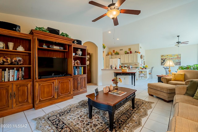 tiled living room with ceiling fan