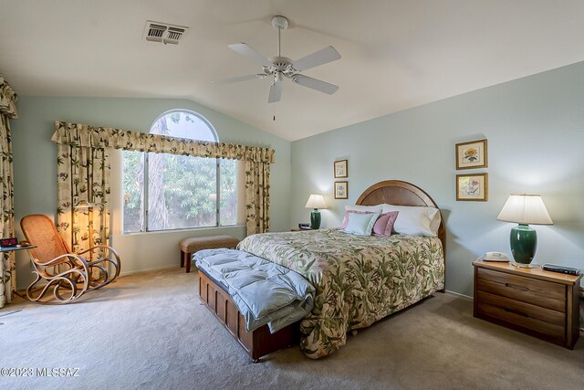 bedroom featuring vaulted ceiling, ceiling fan, and carpet flooring