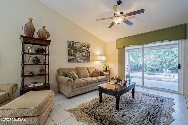 living area featuring ceiling fan, visible vents, vaulted ceiling, and light tile patterned flooring