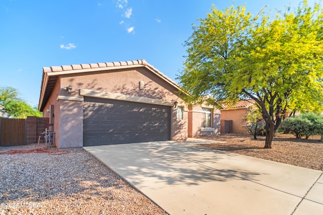 view of front of home featuring a garage