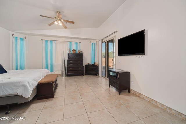 tiled bedroom featuring ceiling fan and vaulted ceiling