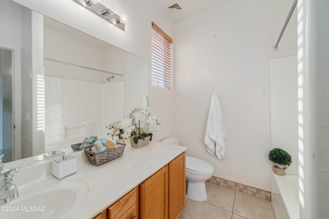 bathroom with shower / bathtub combination, visible vents, toilet, vanity, and tile patterned floors