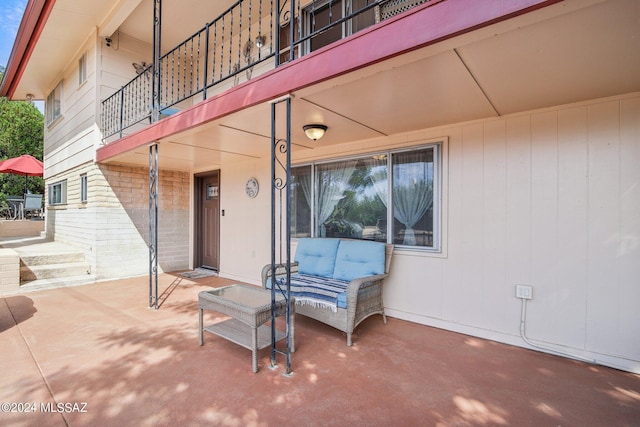 view of patio with a balcony