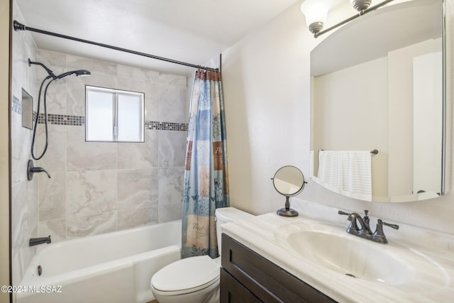 bathroom featuring shower / tub combo, toilet, and vanity