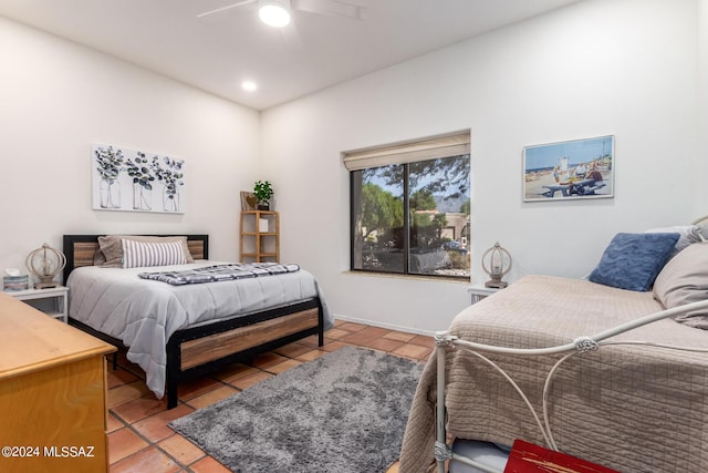 bedroom featuring light tile patterned floors, a ceiling fan, and recessed lighting