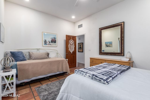 tiled bedroom with visible vents, a ceiling fan, and recessed lighting