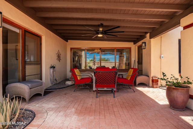 view of patio / terrace featuring ceiling fan and outdoor dining space