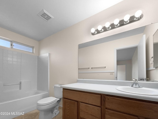 bathroom featuring visible vents, toilet, tub / shower combination, vanity, and tile patterned floors