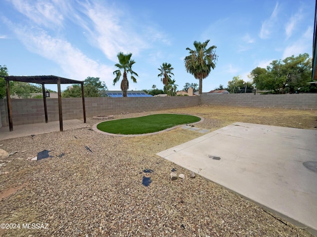 view of yard featuring a fenced backyard and a patio