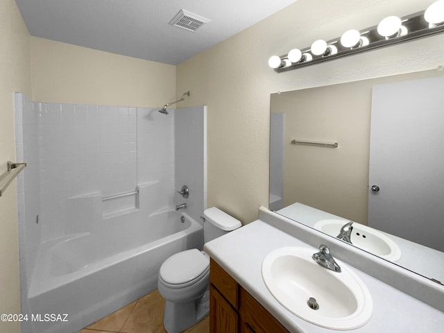 full bathroom with tile patterned flooring, vanity, shower / tub combination, and toilet