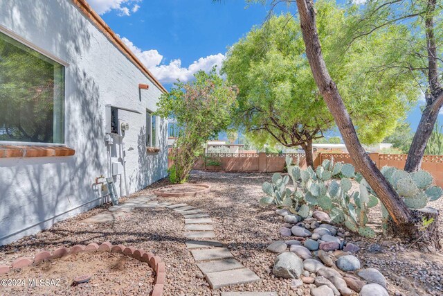 view of yard with fence