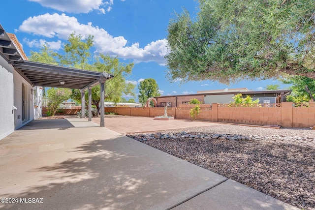 view of yard featuring a patio and a fenced backyard