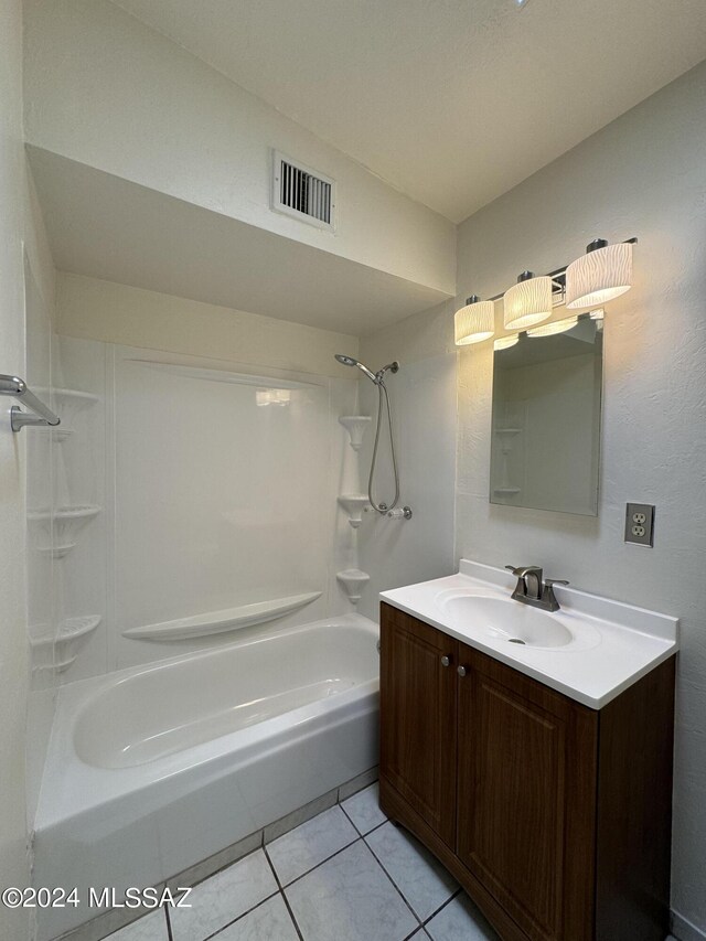 bathroom with vanity, shower / tub combination, and tile patterned floors