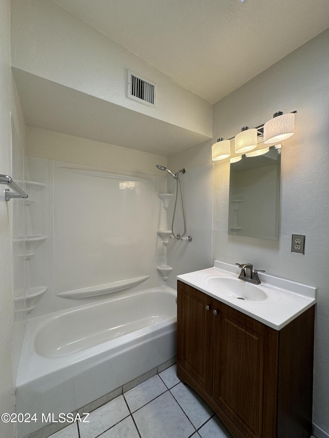 bathroom with vanity, bathing tub / shower combination, visible vents, and tile patterned flooring