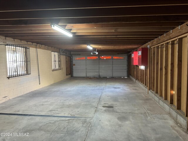 garage featuring a garage door opener