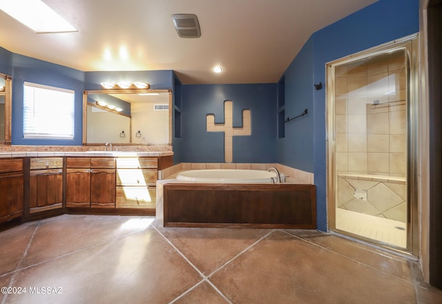 bathroom with shower with separate bathtub and vanity