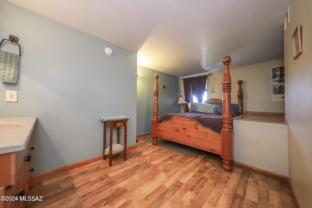 bedroom featuring hardwood / wood-style flooring