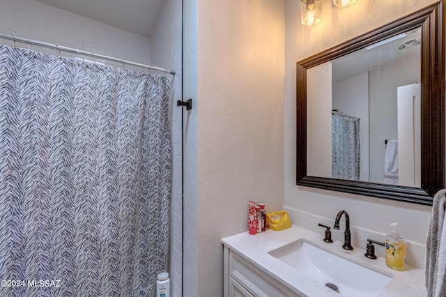 bathroom featuring vanity and a shower with curtain