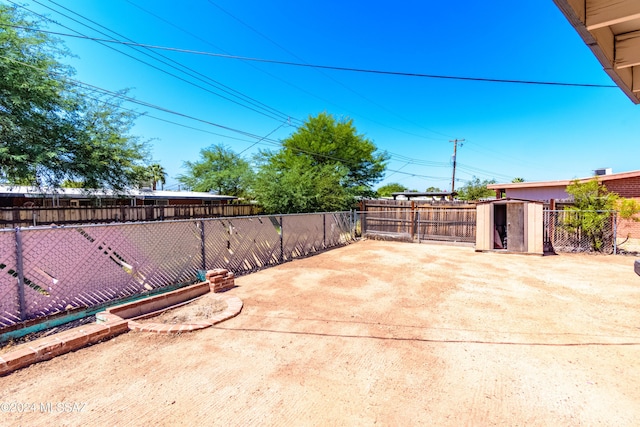 view of patio / terrace featuring a shed