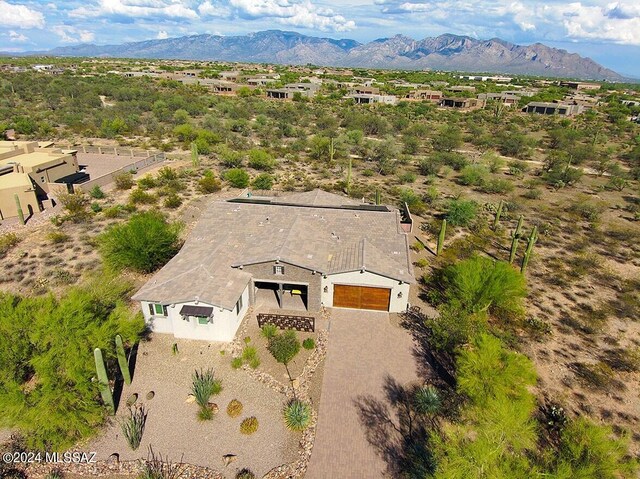 drone / aerial view featuring a mountain view