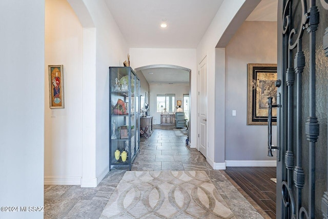 entryway with hardwood / wood-style flooring