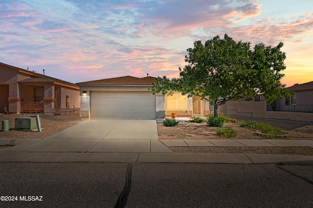 view of front of property featuring a garage