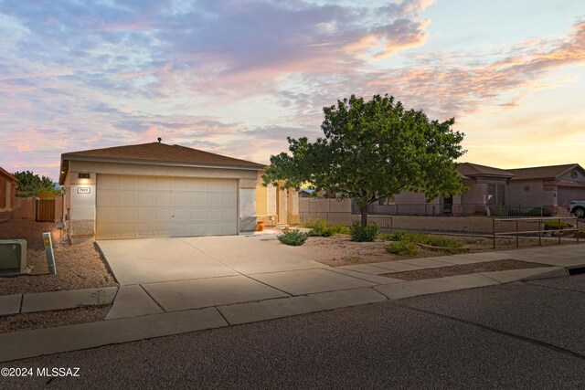 view of front of property featuring a garage