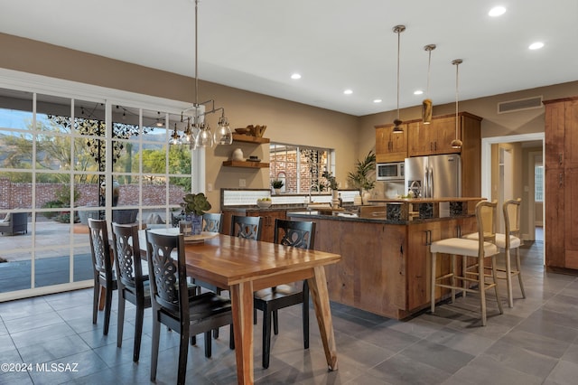 dining room featuring sink