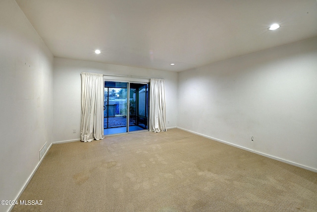 unfurnished room with carpet