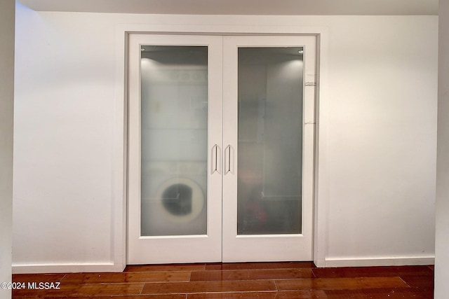 room details with hardwood / wood-style floors and french doors