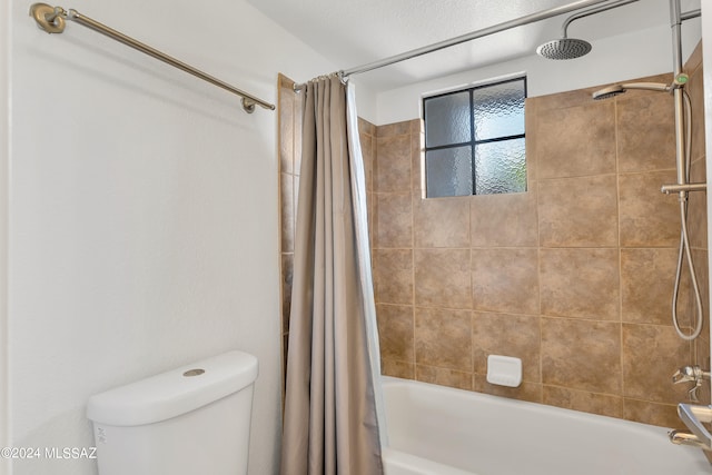 bathroom with toilet and shower / bath combination with curtain