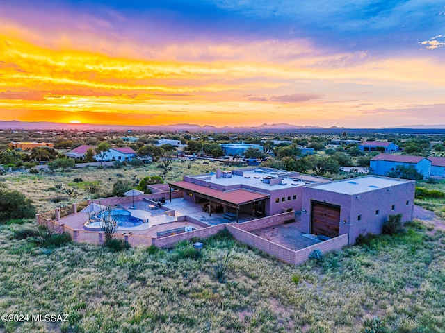 view of aerial view at dusk