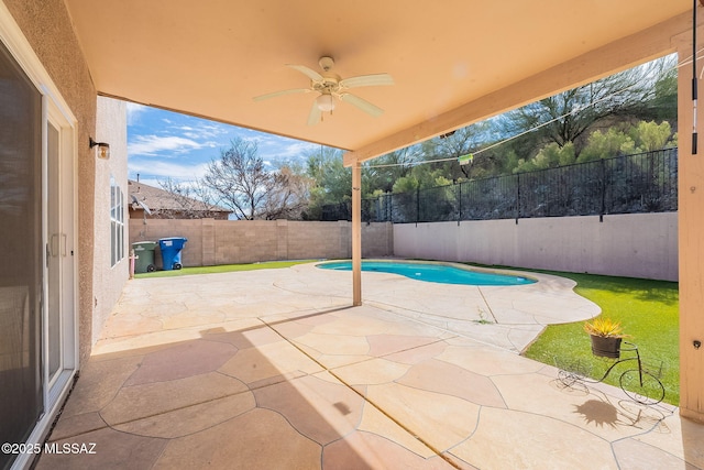 view of pool with a patio area, a fenced backyard, a fenced in pool, and a ceiling fan