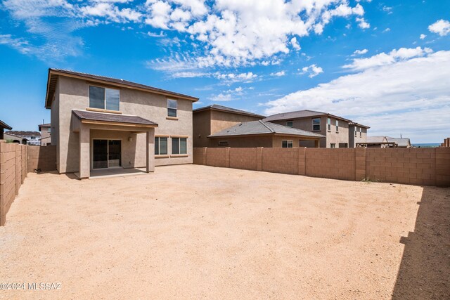 rear view of house with a patio area