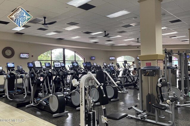 gym featuring a paneled ceiling