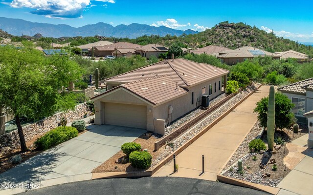 bird's eye view with a mountain view