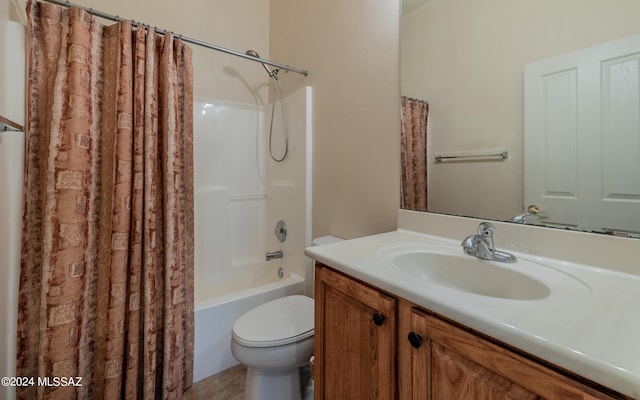 full bathroom with vanity, toilet, and shower / bath combination with curtain