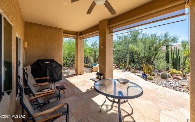 view of patio with a ceiling fan and area for grilling