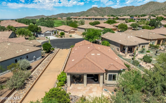 birds eye view of property featuring a mountain view