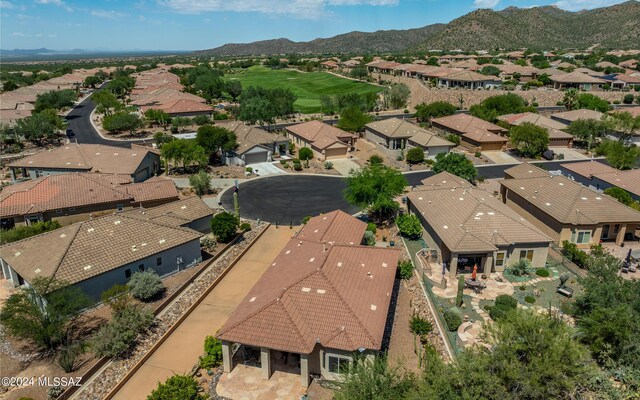 drone / aerial view featuring a mountain view