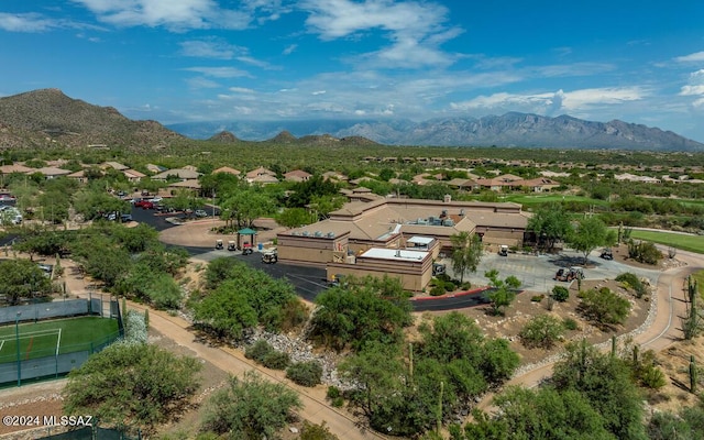 birds eye view of property featuring a mountain view