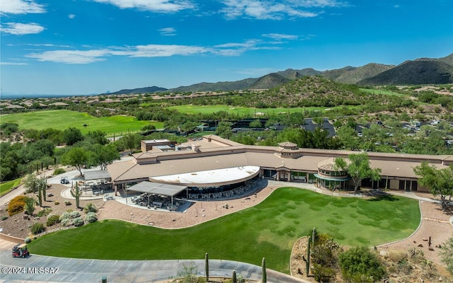 birds eye view of property featuring a mountain view