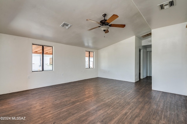 empty room with dark wood-type flooring and ceiling fan