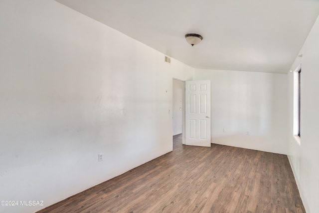 unfurnished room featuring hardwood / wood-style floors