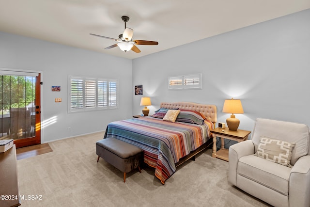 bedroom with light colored carpet and ceiling fan