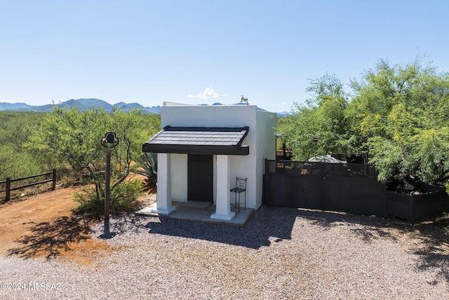 view of outdoor structure featuring a mountain view