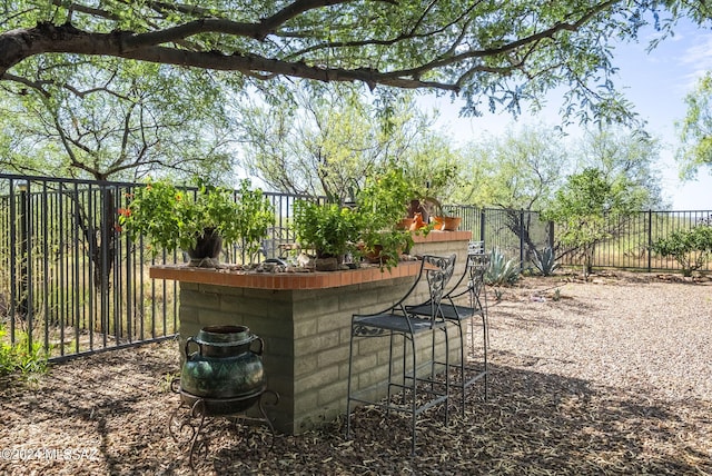 view of patio / terrace featuring a bar