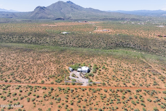 drone / aerial view featuring a mountain view